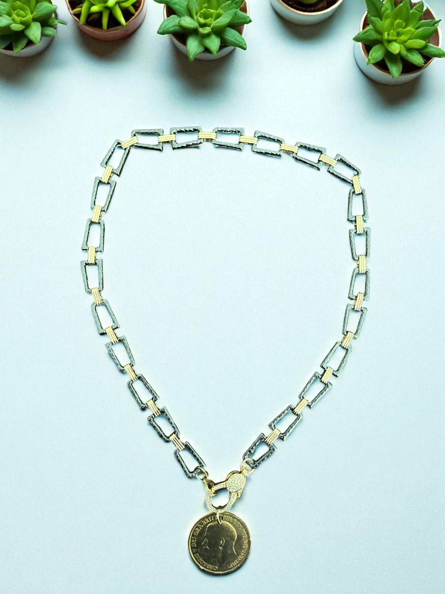 King George on mixed metal chain